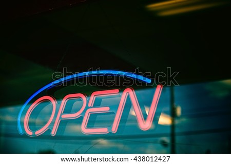 Neon sign with "open" text.