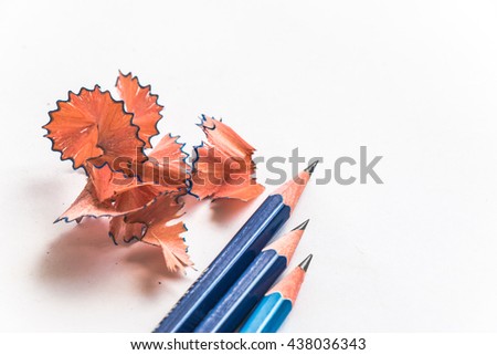 top view of 3 Pencils and sawdust pencil isolate on white paper background