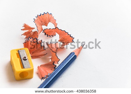 select focus sawdust and  Pencil put near pencil sharpener isolate on white background
