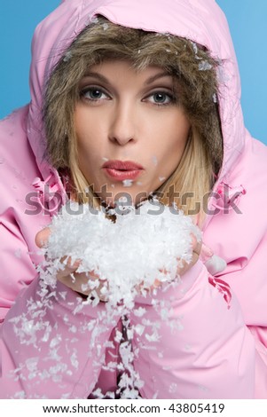 Woman Blowing Snow