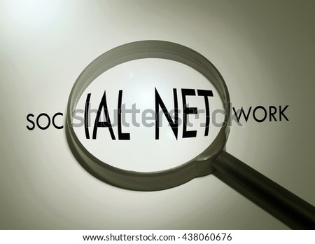 Magnifying glass with the word social network. Searching social network
