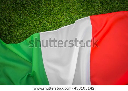 Flags of Italy on green grass