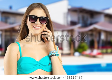 Portrait of a beautiful young woman posing in bikini 