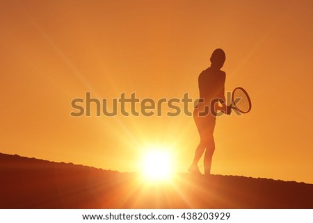 Female athlete playing tennis against clouds