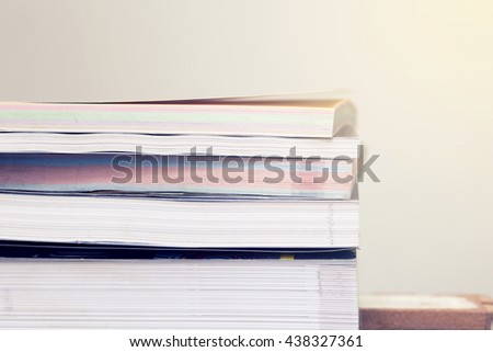 Stack of books with gradient colour filter effect,School Supplies concept.