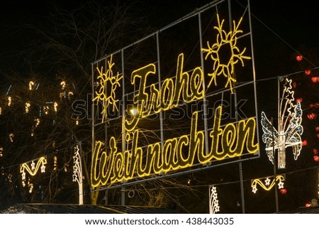 view of a sign stating frohe weihnachten which in german means merry christmas