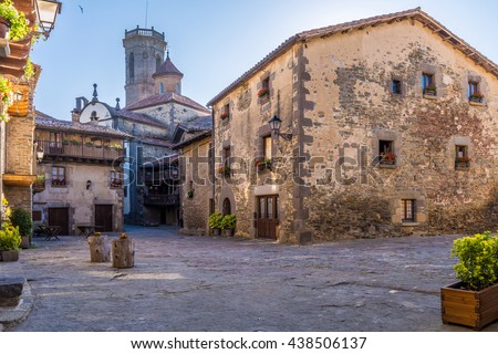 Wonderful perspective of the village, the church tower, in Rupit (SPAIN). Royalty-Free Stock Photo #438506137