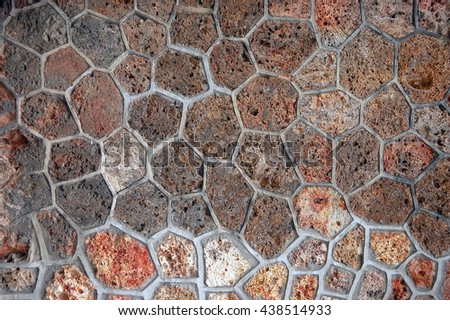 Closeup of sandstone wall honeycomb masonry texture