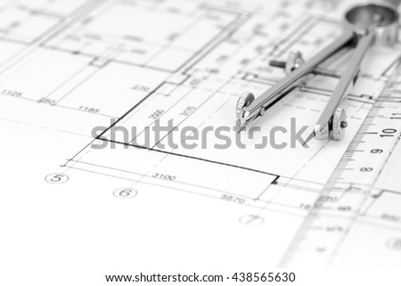 architectural drawings with house plan and drawing compass