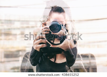 Double exposure of girl portrait taking photos