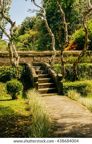 Stairs in a temple garden in Indonesia Royalty-Free Stock Photo #438684004