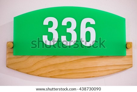 Number plate on wood.