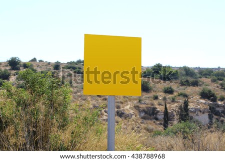 Blank and empty yellow road sign