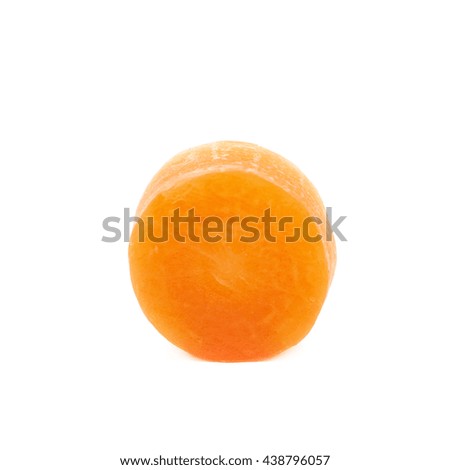 Single baby carrot slice isolated over the white background