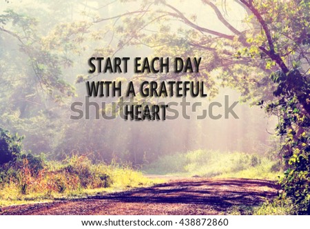 Inspirational quote with phrase: start each day with grateful heart. Blur background, retro style,