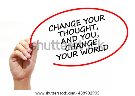 Man writing CHANGE YOUR THOUGHT, AND YOU, CHANGE YOUR WORLD with marker on transparent wipe board. 