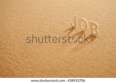 job word made of wood with shadow on compressed board