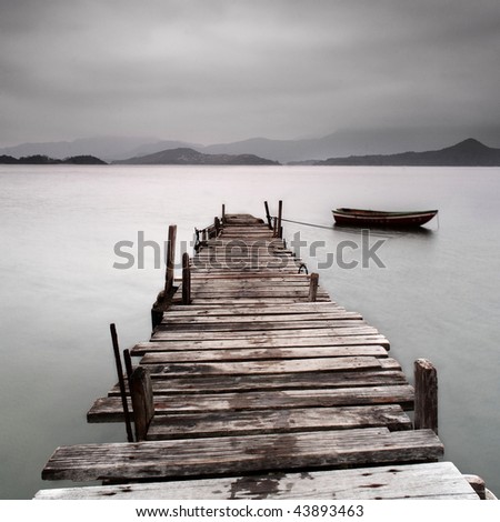pier and boat, low saturation Royalty-Free Stock Photo #43893463