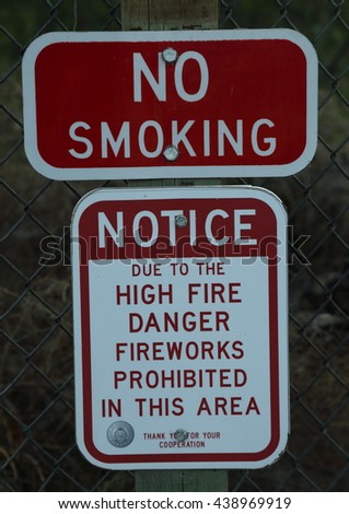 Signs in New Mexico reading "No Smoking" and "High Fire Danger Fireworks Prohibited"