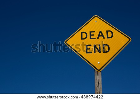 Yellow traffic sign,Dead end with wooden pole on the side of the road,street background with blue sky,warning in the country,walk way,car,drive,travel,journey to tell direction, and symbolic rule
