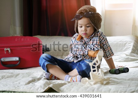 little boy playing with toy airplane,Travel and adventure concept