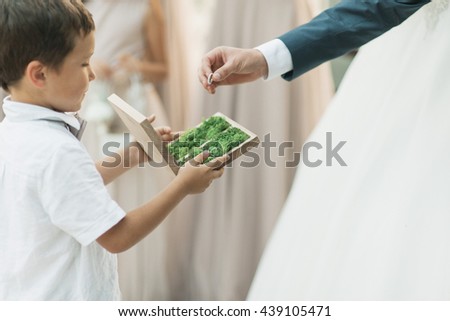 young couple wearing wedding rings