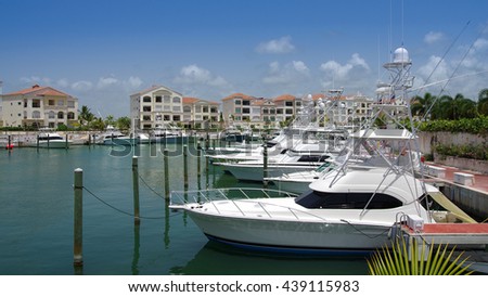 Rich yachts at the dock, Caribbean, Dominican Republic, region Punta Cana Royalty-Free Stock Photo #439115983