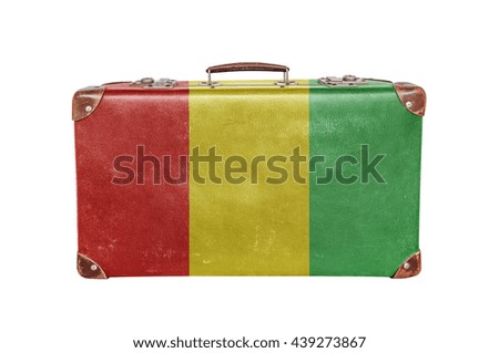 Vintage suitcase with Guinea flag