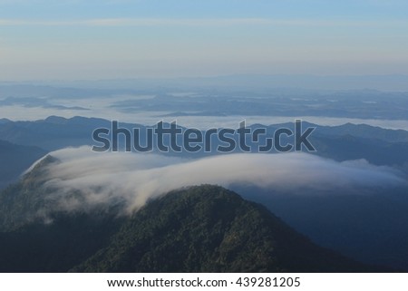 Reflection light and shadow sea mist on the mountain scenery atmosphere during the morning the sun and  mist , black and white , dark-toned color ,Low key photo of landscape Location North of Thailand