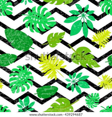 Summer background with tropical leaves on chevron. Seamless pattern for invitation, card, poster, cover, packaging and fabric design. Jungle pattern.
