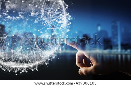Businessman in dark office using digital tactile world interface with his finger '3D rendering