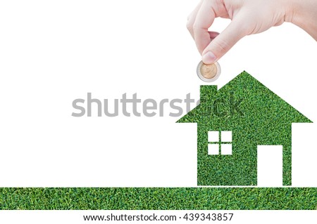 Coin Hand holding house icon in nature as symbol of mortgage,Dream house on nature background,and space for your text