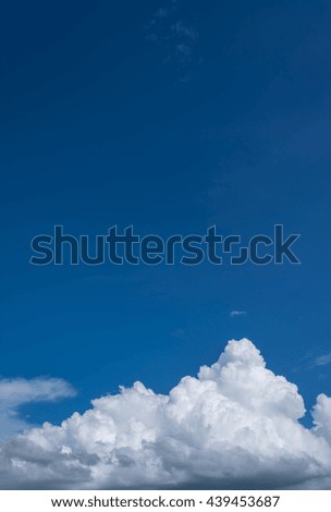 image of blue sky with white clouds on day time for background.(vertical)