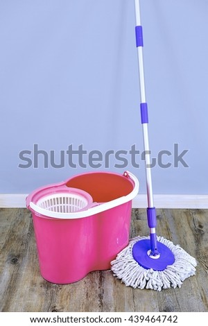 A studio photo of a cleaning mop