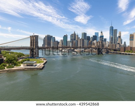 New York City Manhattan downtown buildings skyline Brooklyn Bridge