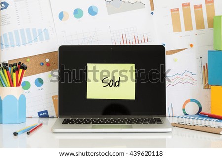  SOLD sticky note pasted on the laptop screen