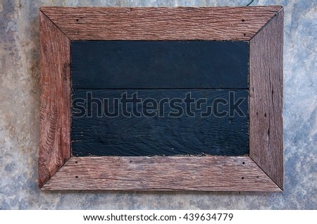 empty old wood frame on cement background