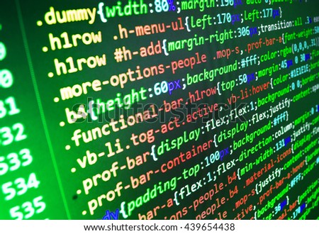 Website codes on computer monitor. Developer working on websites codes in office. Software development. Computer script.  Monitor photo. Writing program code on computer. Website development.  
