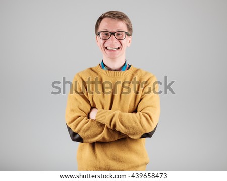 Man making gesture isolated on gray background