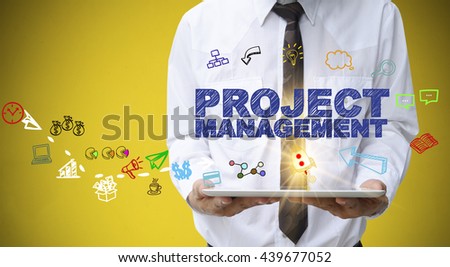 businessman holding a tablet computer with PROJECT MANAGEMENT  text ,business concept ,business idea