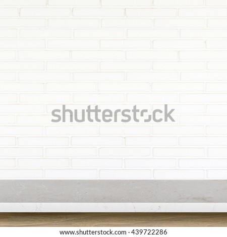 Empty top of stone table on white brick wall background. For product display