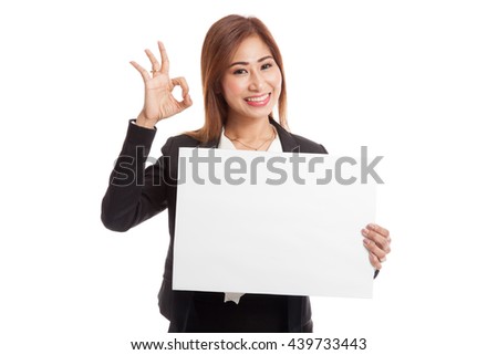 Young Asian business woman show OK with  white blank sign  isolated on white background