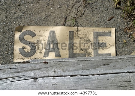 An old sale sign from a flea market