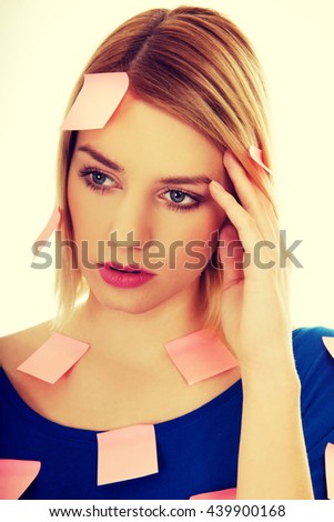 Woman with sticky notes.