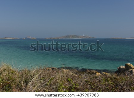 Old Grimsby Sound from Blockhouse Beach with the Round Island Lighthouse in the Background on the Island of Tresco in the Isles of Scilly, England, UK