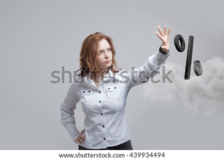 Woman showing symbol of percent. Bank Deposit or Sale concept.