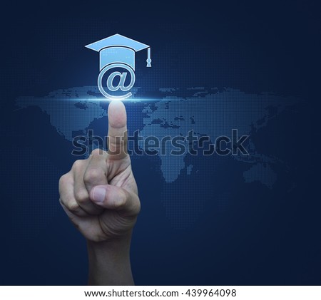 Hand pressing e-learning icon over digital world map blue background, Study online concept, Elements of this image furnished by NASA