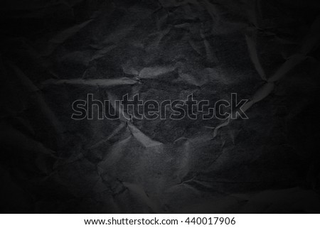 Dark black paper with light texture background