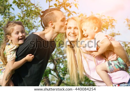 Portrait of a happy family outdoors