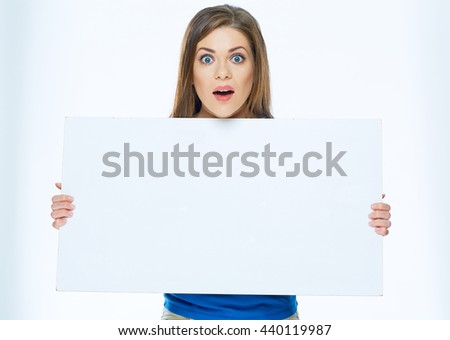 Surprised woman holding advertising board. Big white banner with copy space.